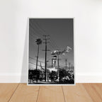 Natural wood-framed semi-glossy poster of iconic LA Westside Road, black and white California wall art, studio edition print.