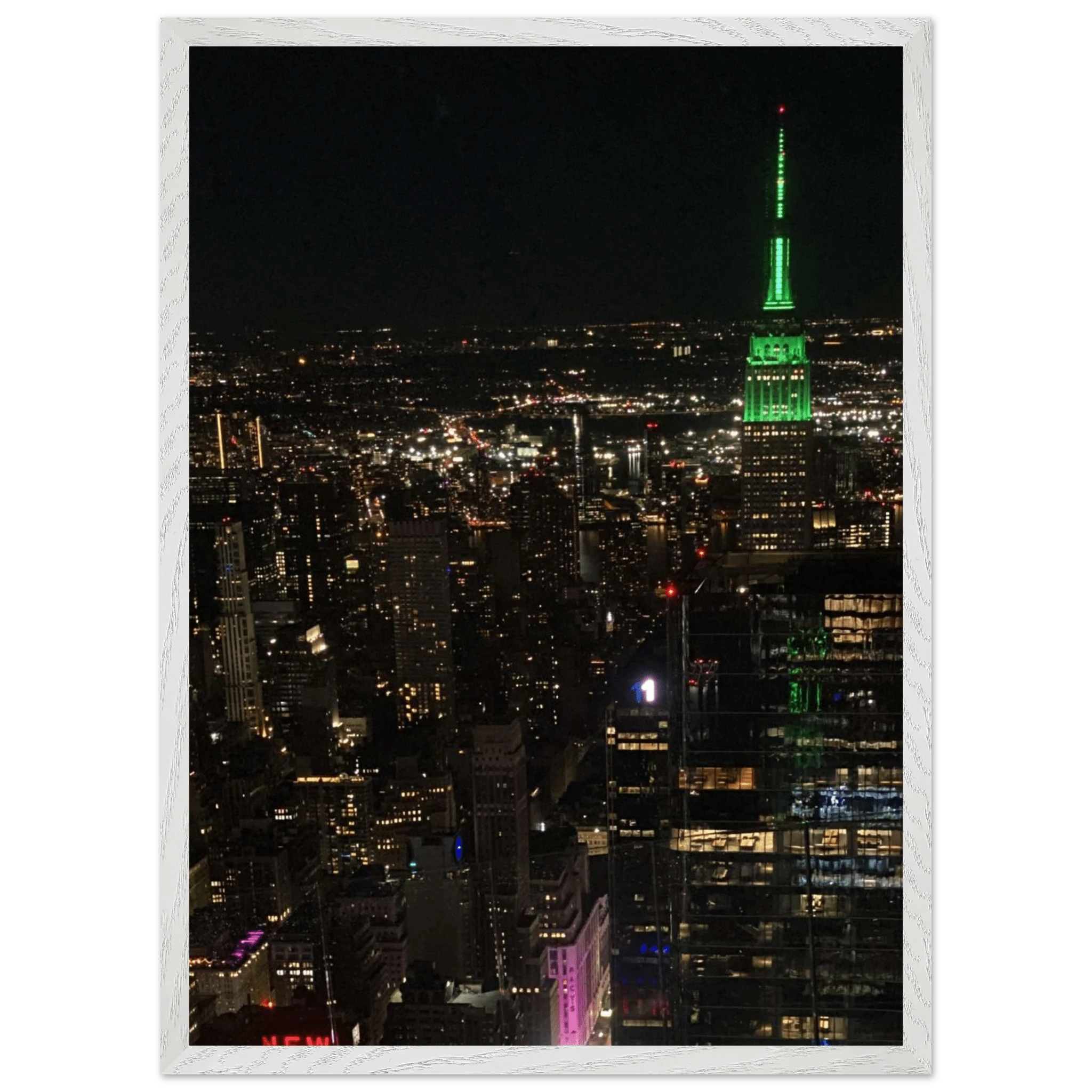 Premium wood-mounted framed poster of NYC downtown night view with Empire State Building, part of the Studio Edition Travel Collection.