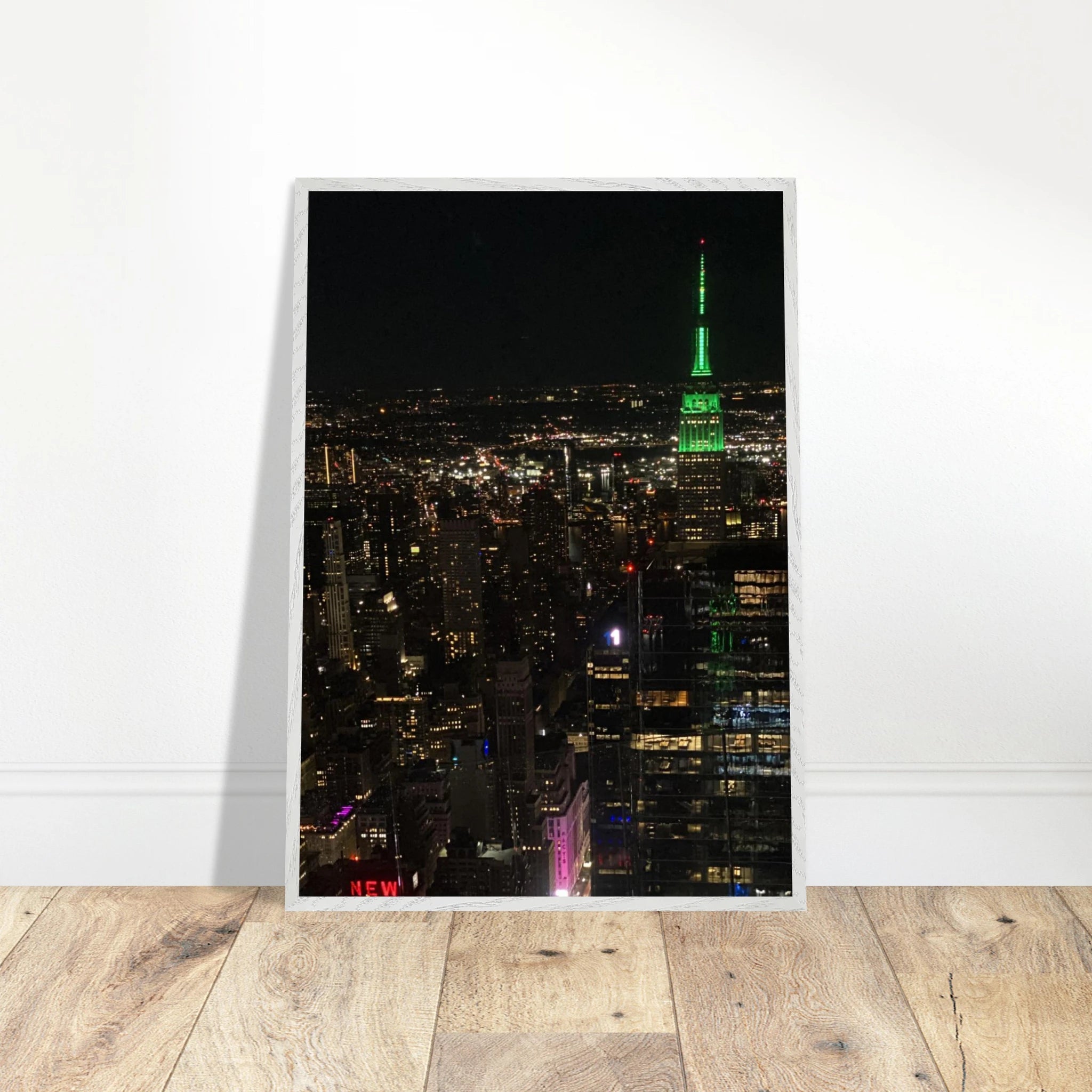 Premium wood-mounted framed poster of NYC downtown night view with Empire State Building, part of the Travel Collection studio edition.