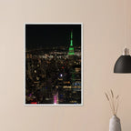 Premium wood-mounted framed poster of NYC Downtown night view with Empire State Building, part of the Studio Edition Travel Collection.