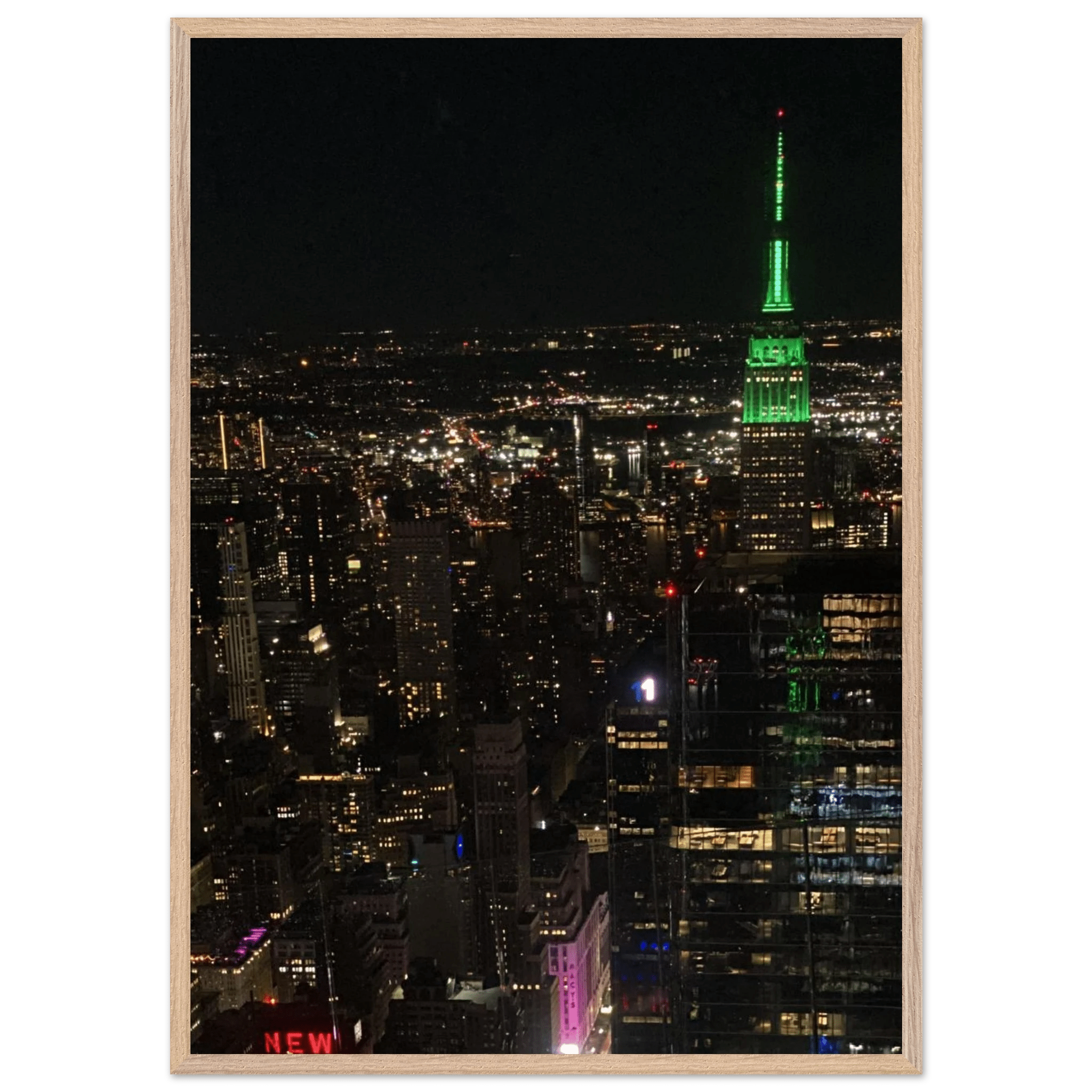 Premium wood-mounted framed poster of NYC downtown night view with Empire State Building, 15x20 cm print in white frame.