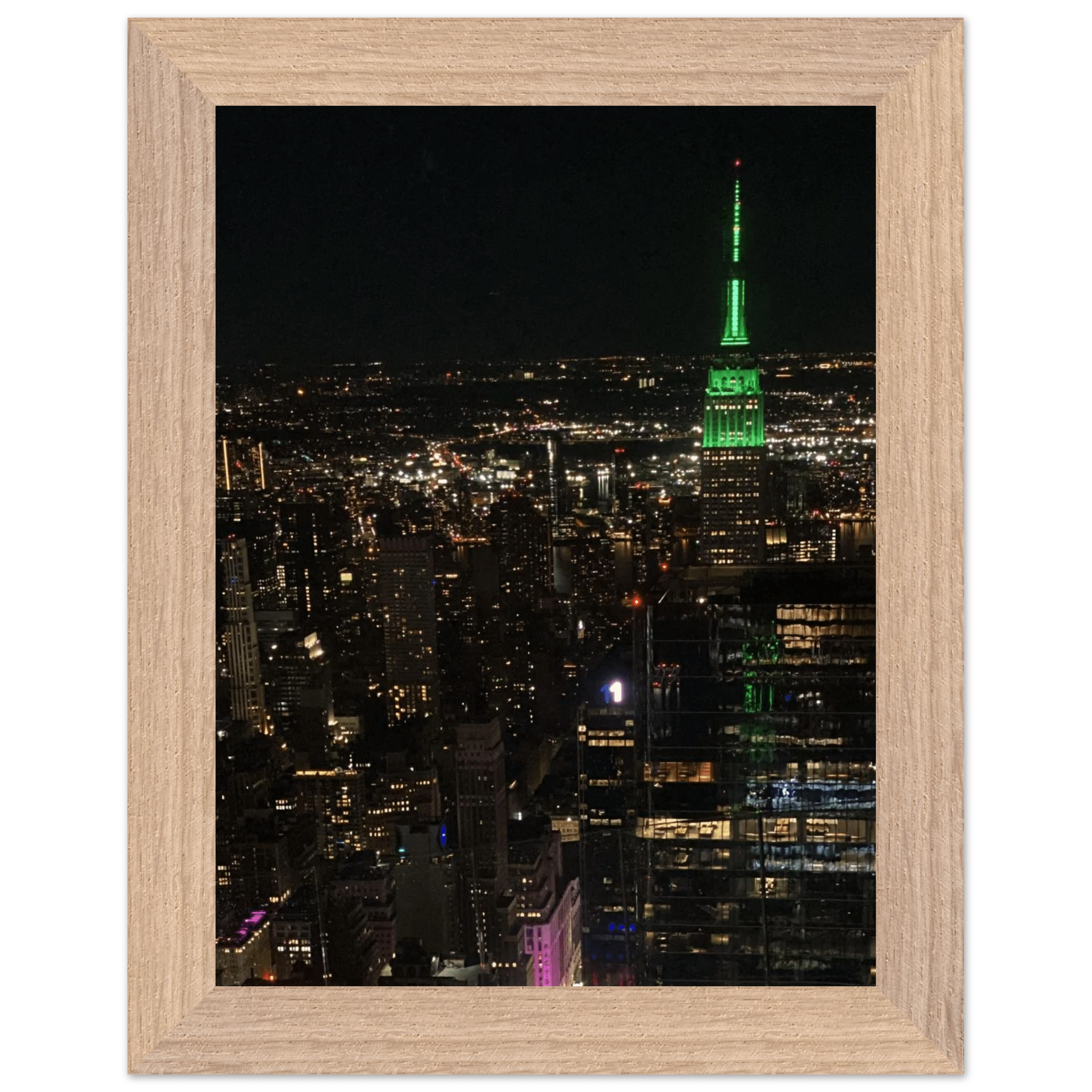 Wood-mounted framed poster of NYC downtown night view featuring the Empire State Building, part of the Travel Collection Studio Edition.