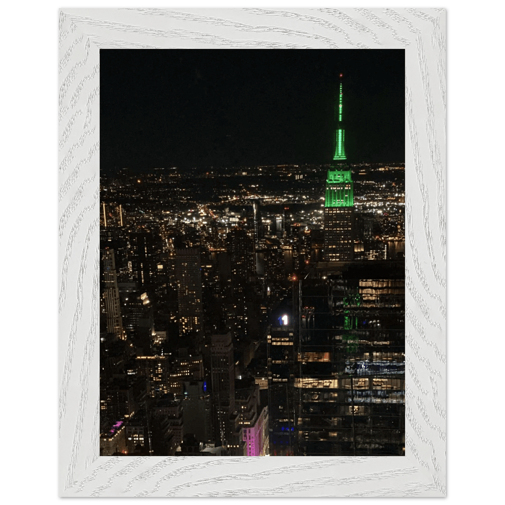 Premium wood-mounted framed poster of NYC downtown night view with Empire State Building, 15x20 cm print in white frame.