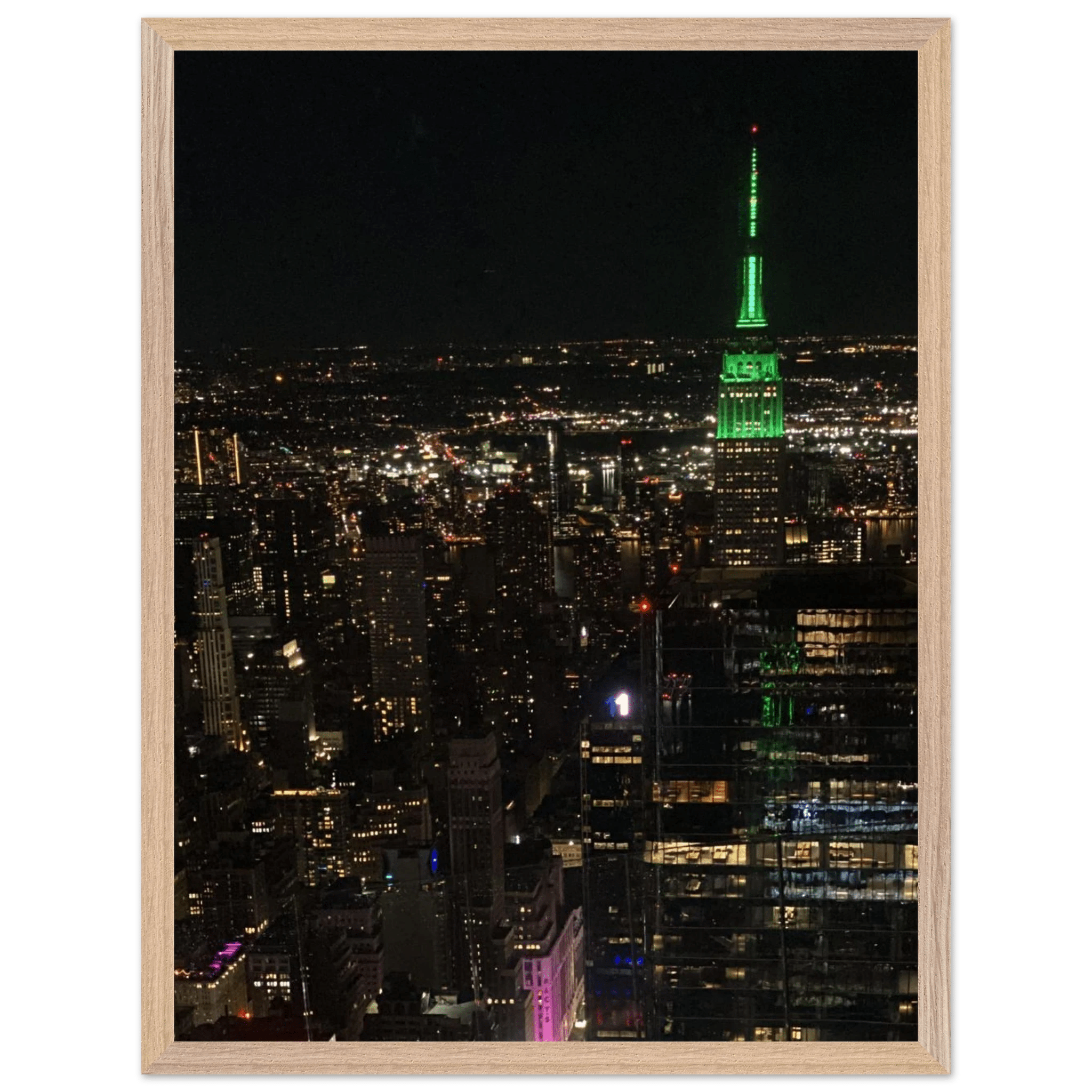 Wood-mounted framed poster of NYC downtown night view featuring the Empire State Building, part of the Travel Collection Studio Edition.