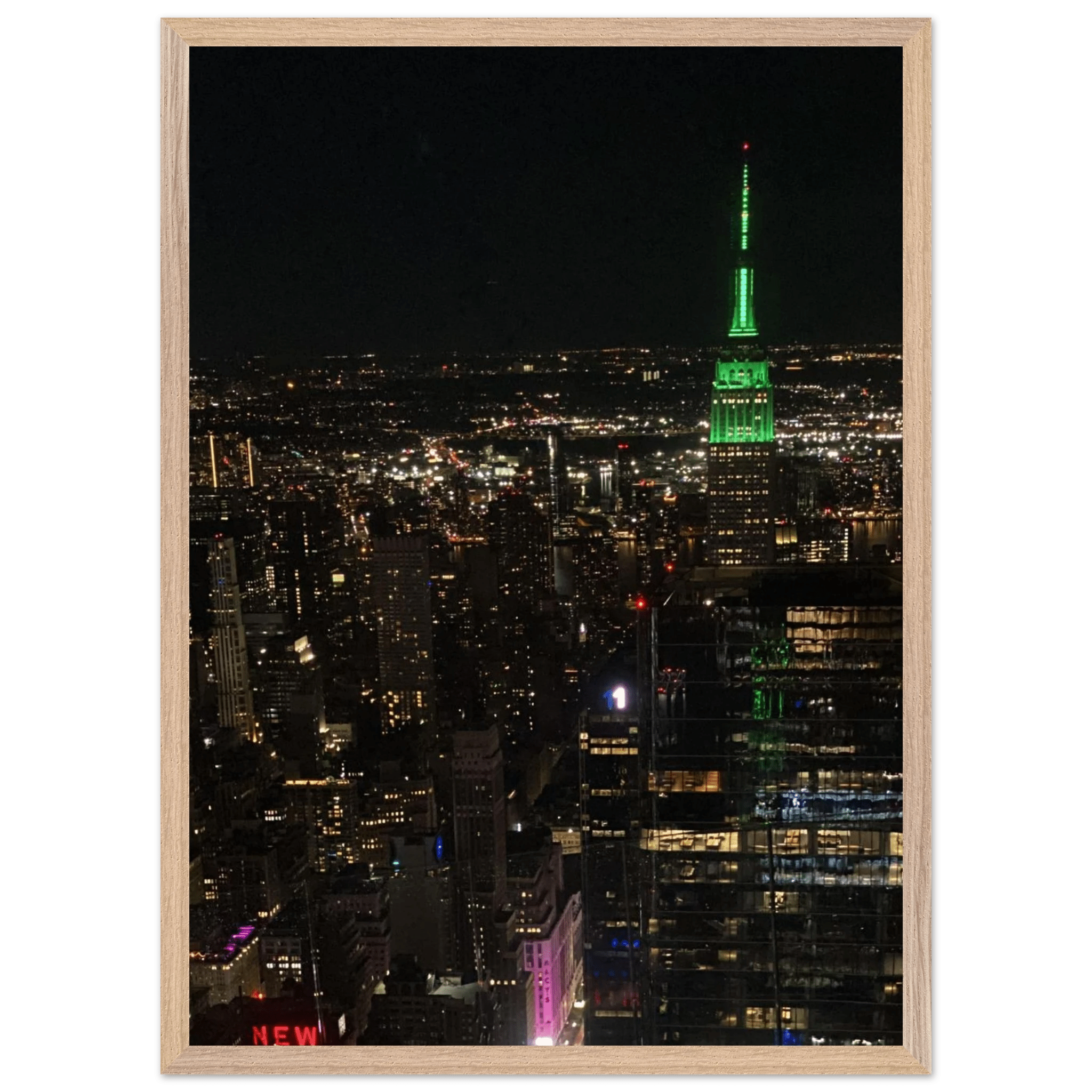 Wood-mounted framed poster of NYC downtown night view featuring the Empire State Building from the Travel Collection Studio Edition.