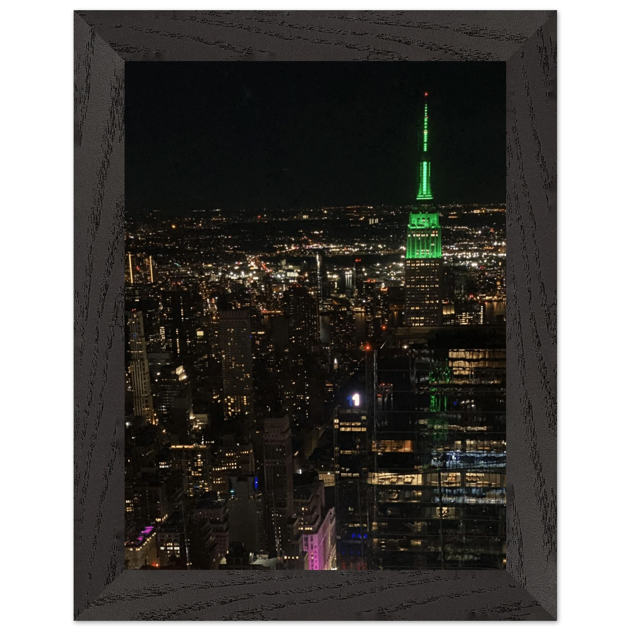 Wood-mounted framed print of NYC downtown night view featuring the Empire State Building, part of the Travel Collection Studio Edition.