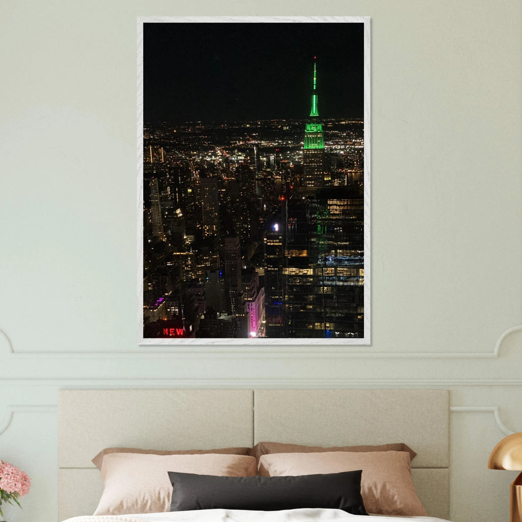 Premium wood-mounted NYC downtown night view poster with Empire State Building in a white frame, part of the Travel Collection Studio Edition.