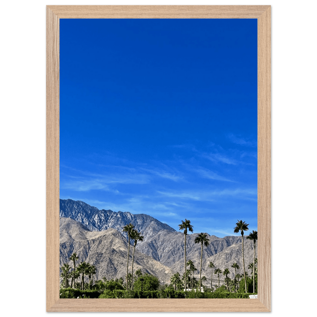 Wooden framed poster featuring a sunny fall day scene in Palm Springs California, with vibrant autumn colors and scenic landscape.