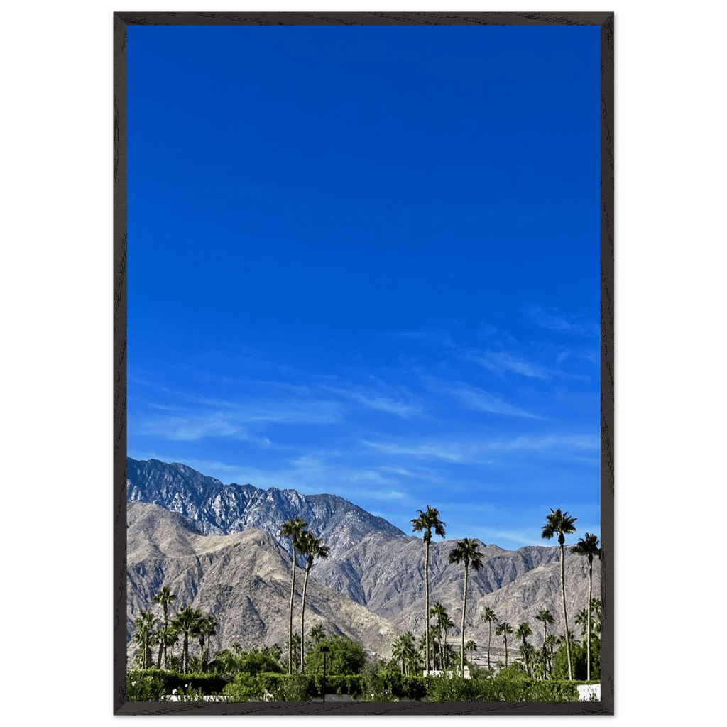 Wooden framed poster of a sunny fall day in Palm Springs, California, featuring colorful autumn scenery and studio edition art.