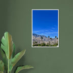 Wooden framed poster depicting a sunny fall day in Palm Springs with vibrant autumn colors, California poster art, studio edition.