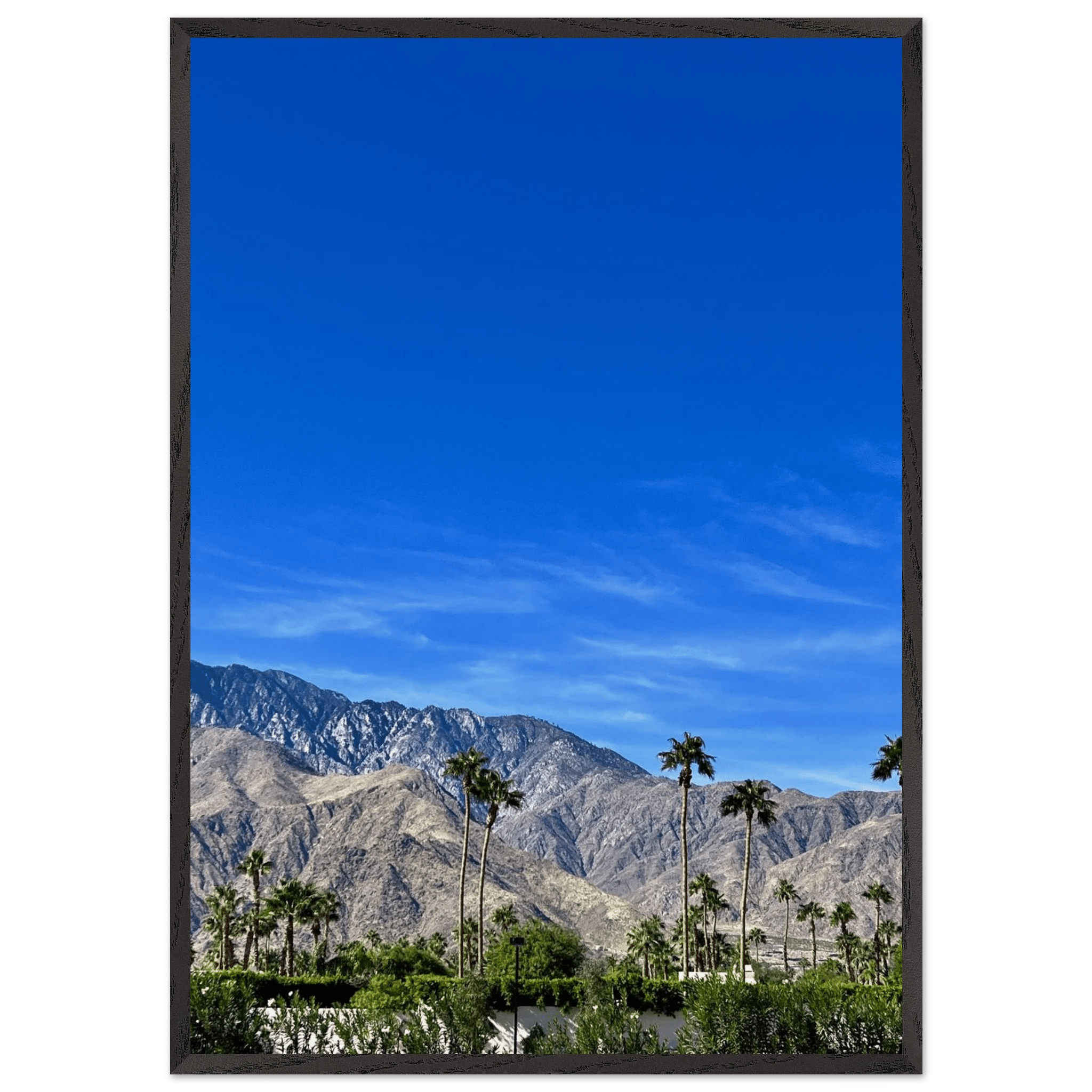 Wooden framed poster of a sunny fall day in Palm Springs, California, featuring vibrant desert landscape artwork.