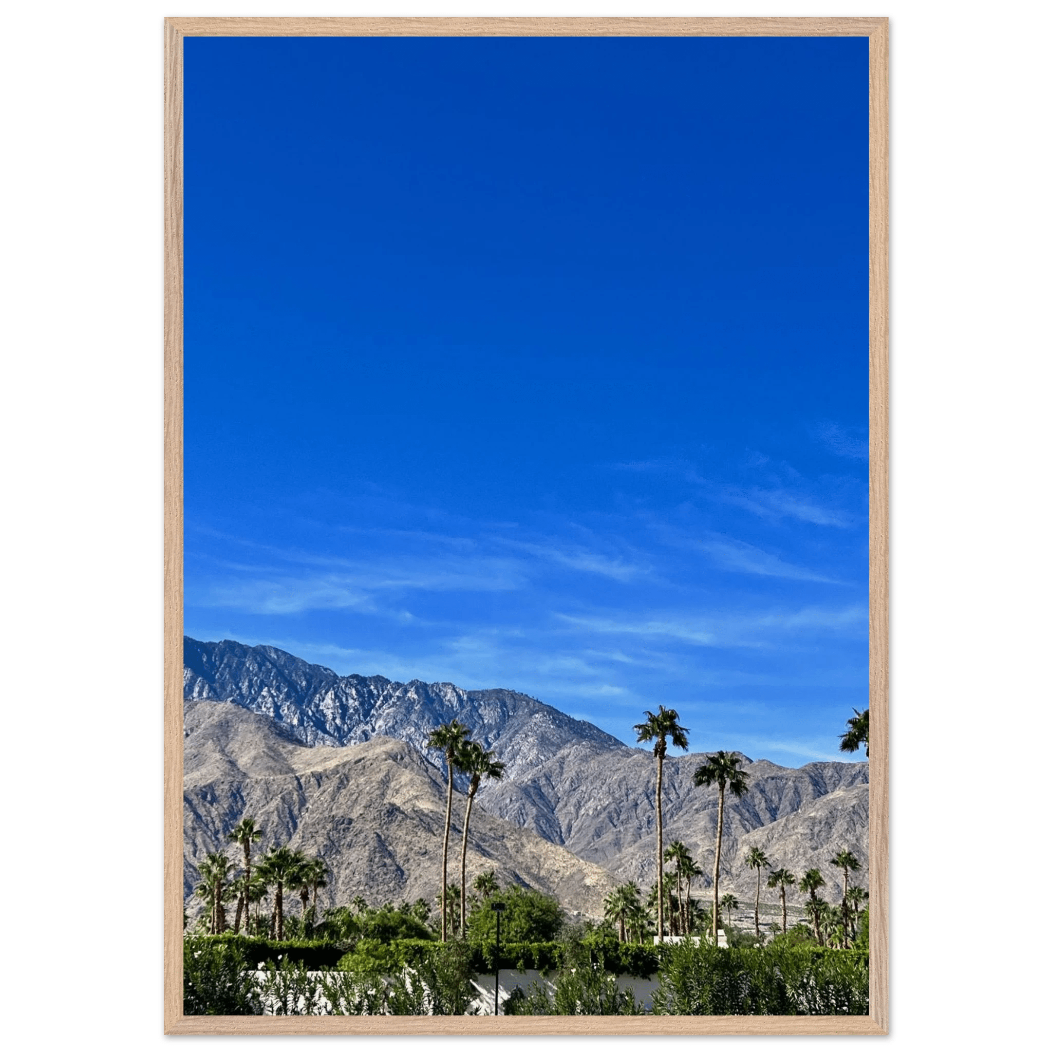 Wooden framed poster featuring a sunny fall day scene in Palm Springs, California, with vibrant autumn colors and scenic landscape.