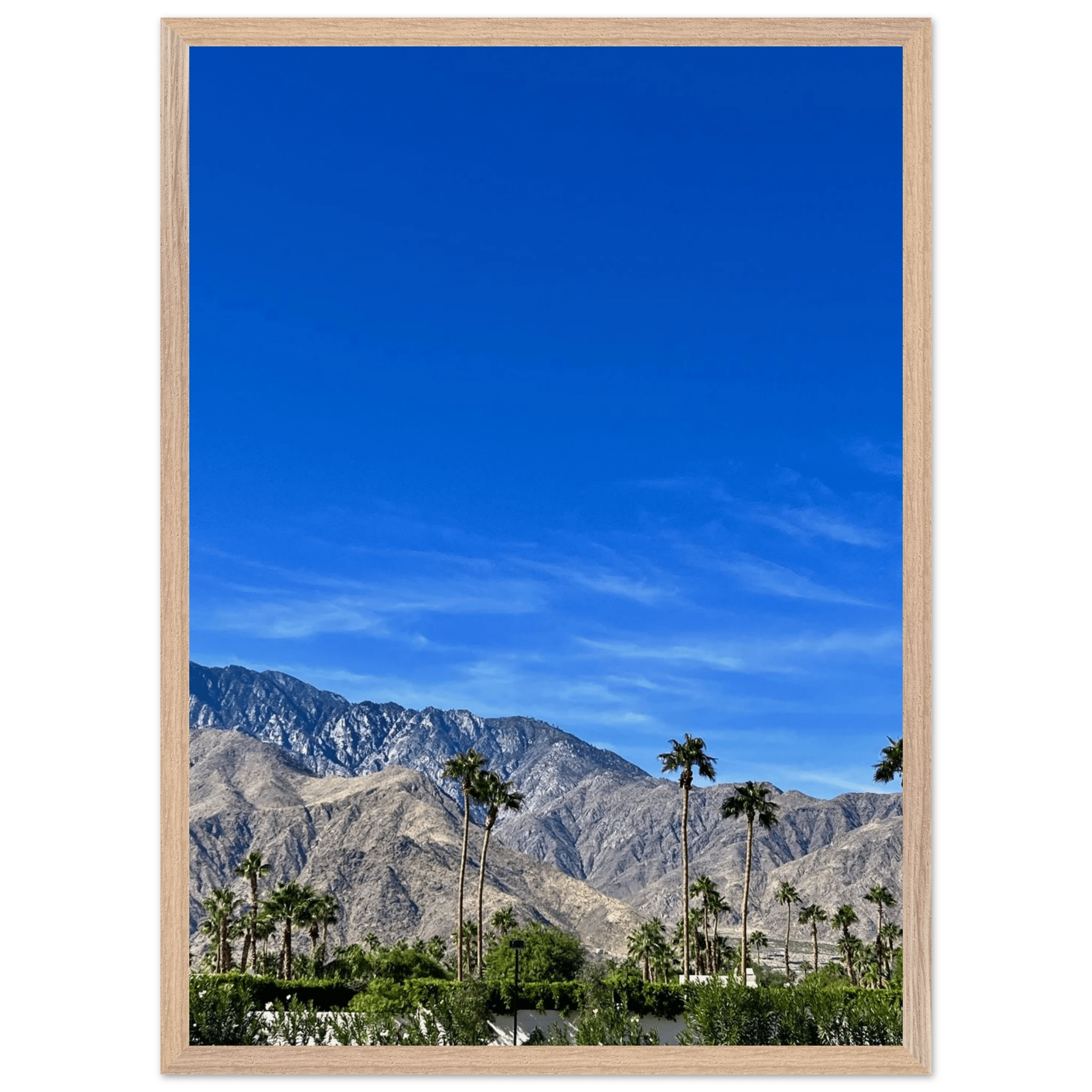 Premium wooden framed poster featuring a sunny fall day in Palm Springs, California, with vibrant colors and artistic details.