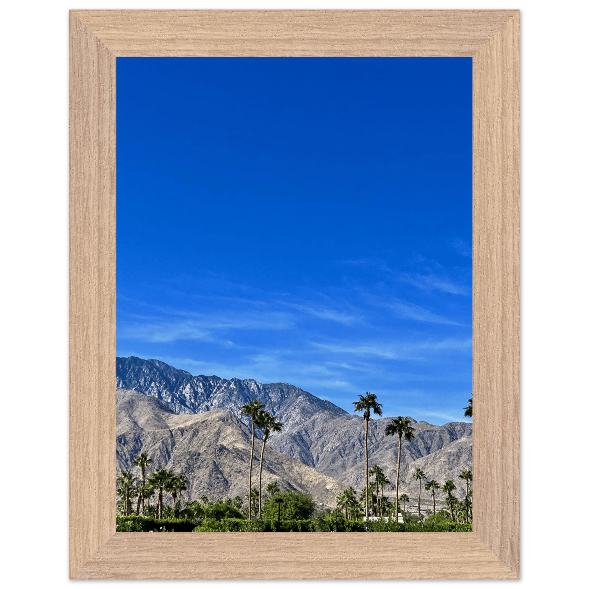 Premium wooden framed poster depicting a sunny fall day in Palm Springs California, featuring vibrant autumn scenery and studio artwork.
