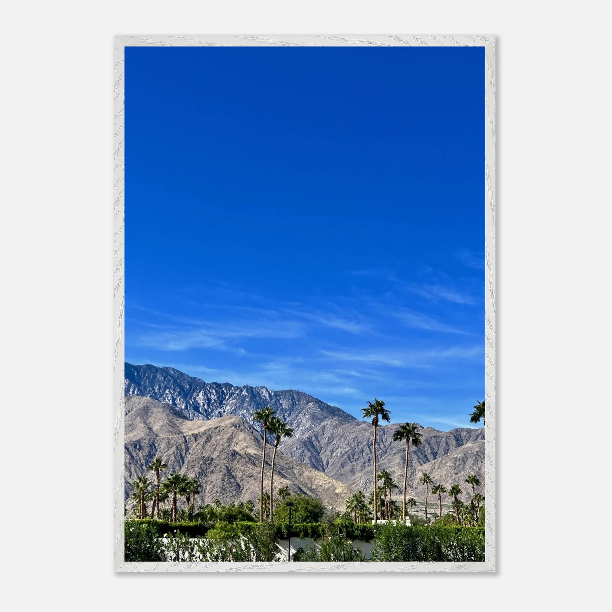 Wooden framed poster of a sunny fall day in Palm Springs, California, featuring vibrant outdoor scenery and warm autumn colors.