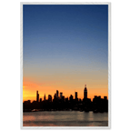 Manhattan Skyline Sunset framed poster from My Store featuring NYC wall art in a white wooden frame, perfect for home decor.