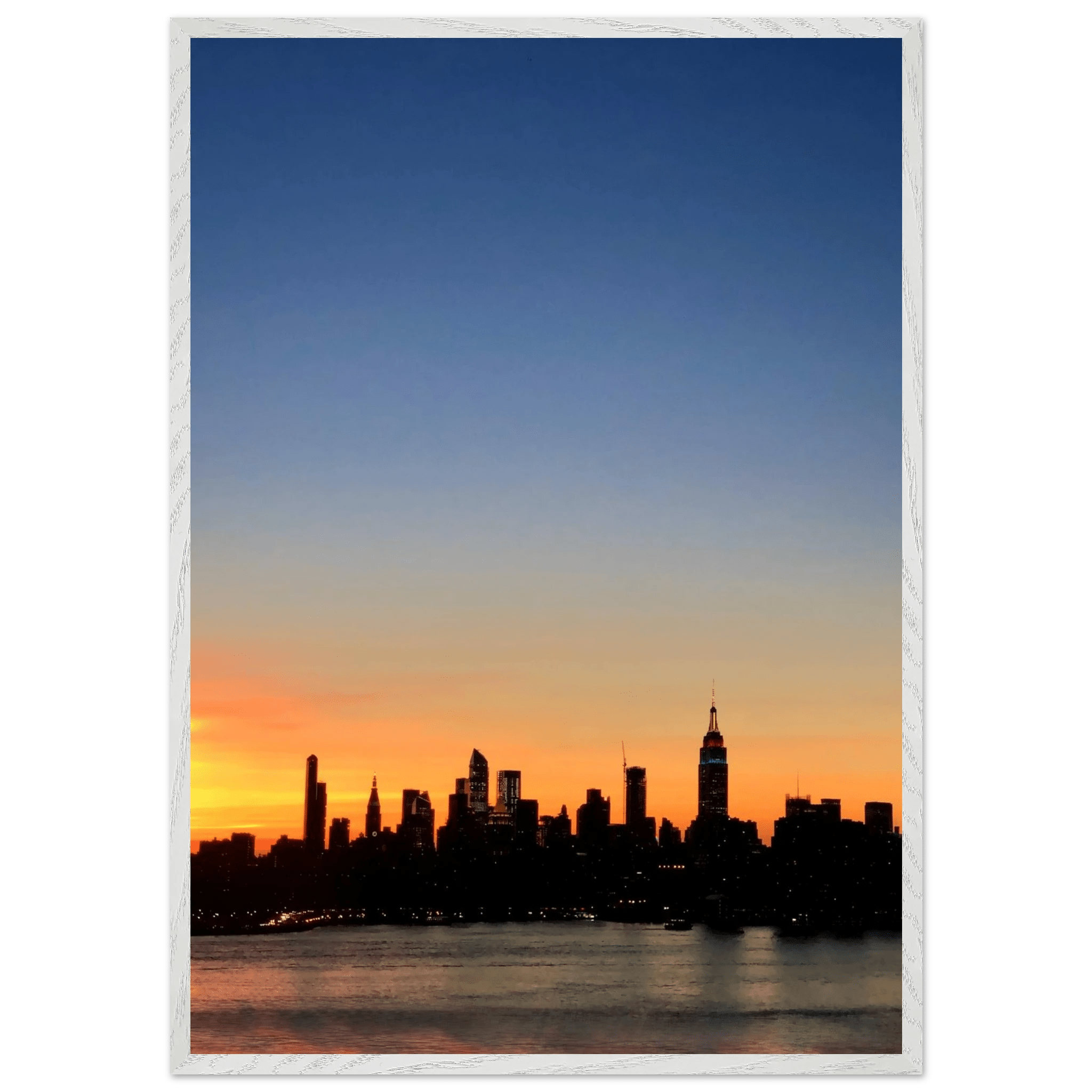 Wooden framed Manhattan skyline sunset poster, majestic wall art print from travel collection, ideal for home décor.