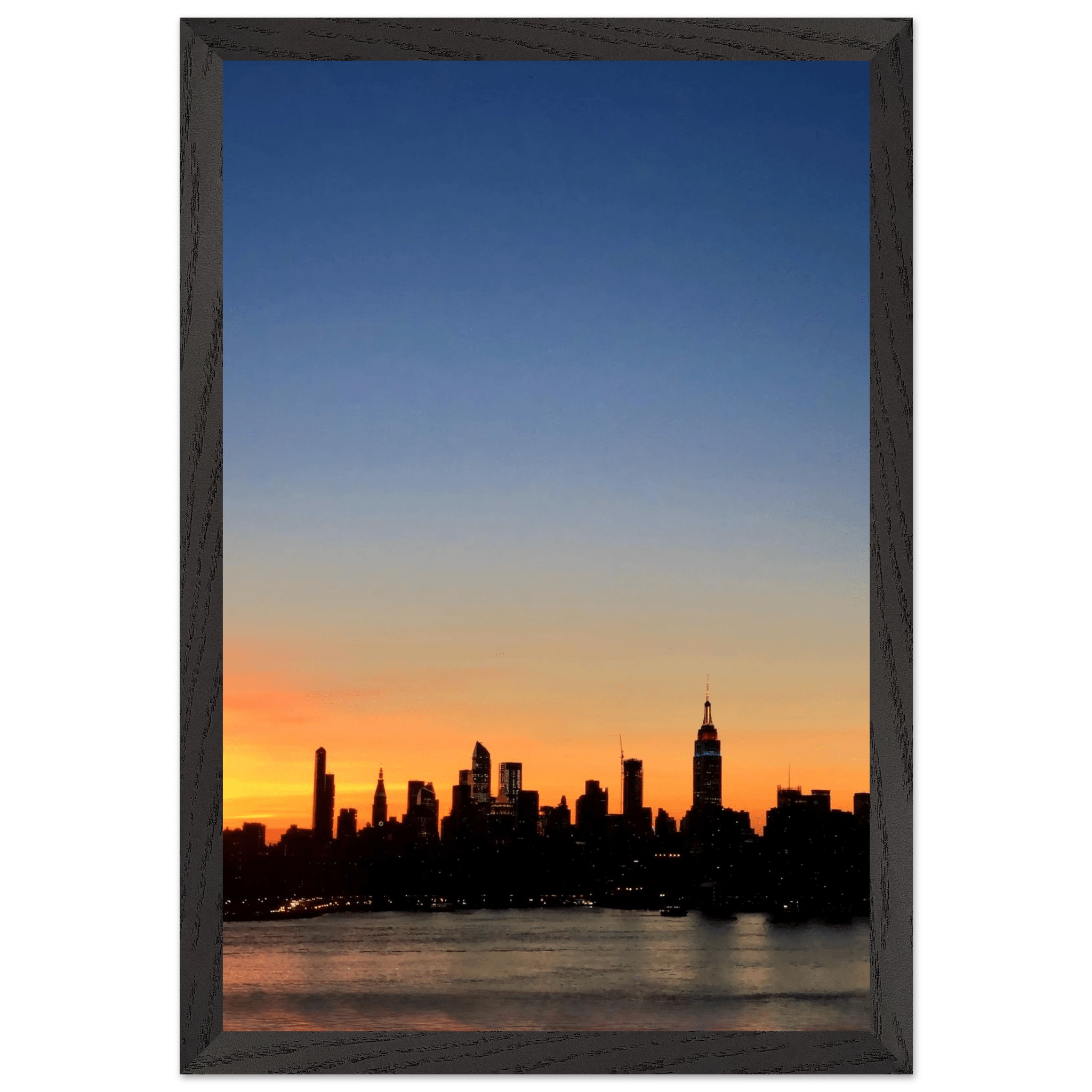 Wooden framed Manhattan Skyline sunset poster, majestic wall art for home decor, part of travel collection studio edition.