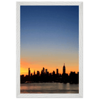 Manhattan Skyline Sunset framed poster, NYC wall art print on premium wood frame, perfect for home decor and travel collection display.