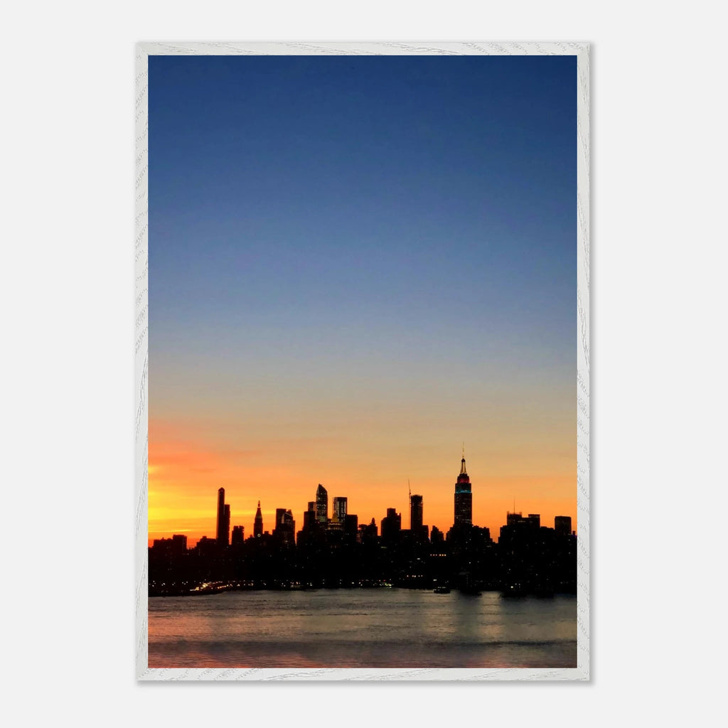 Wooden framed Manhattan Skyline sunset poster from the Travel Collection, showcasing a vibrant cityscape for home decor.