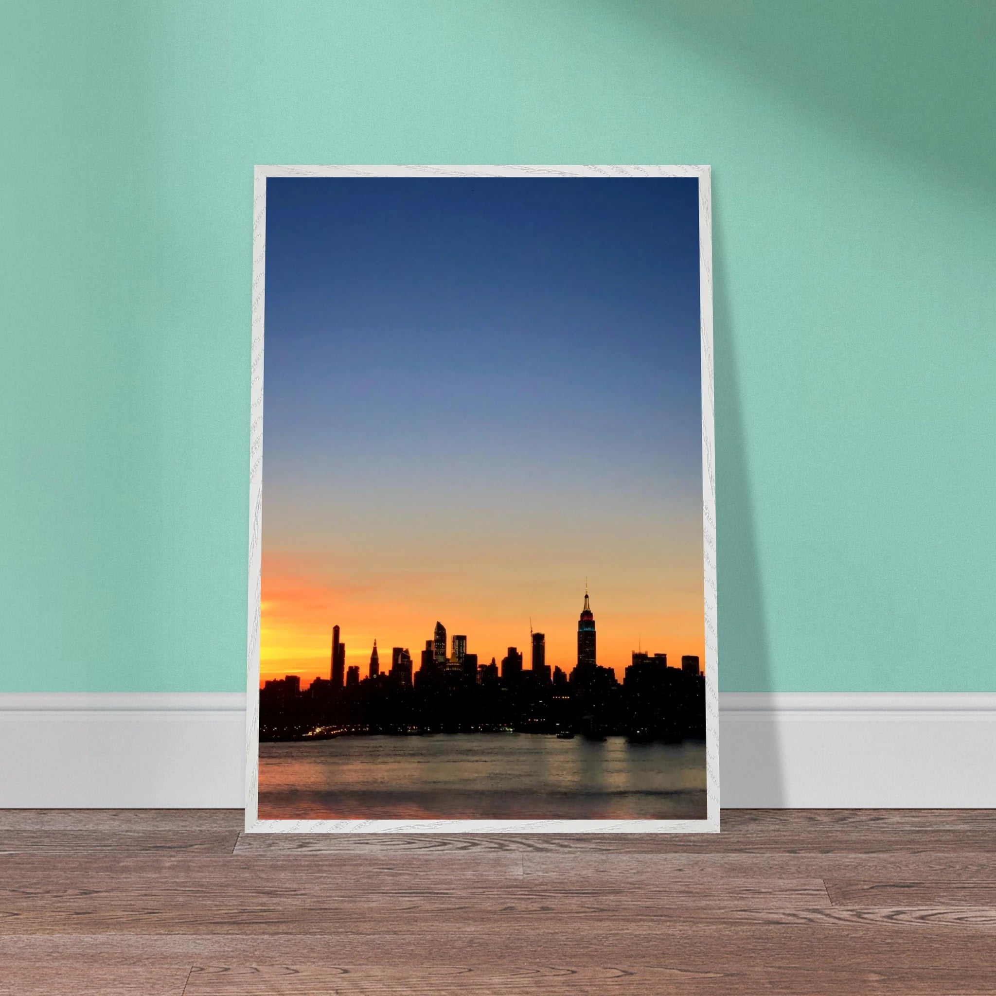 Wooden framed Manhattan Skyline sunset poster, vibrant cityscape wall art from the travel collection, perfect for home décor.