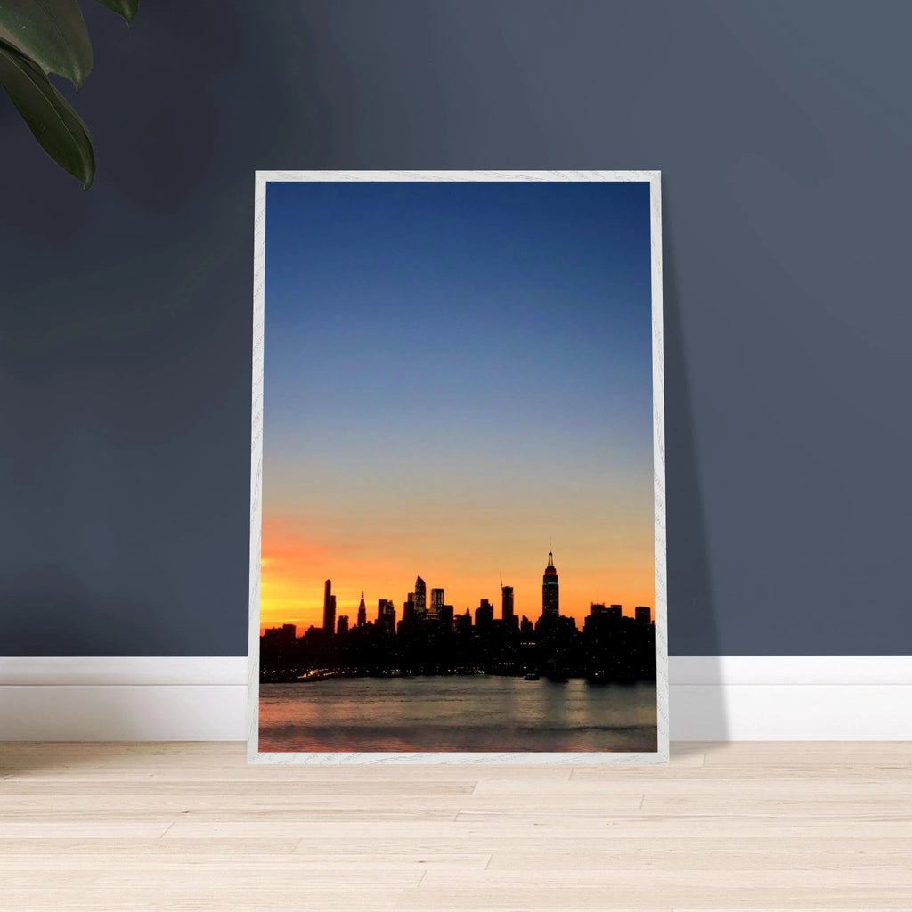 Wooden framed Manhattan Skyline sunset poster, travel-themed wall art, showcasing vibrant cityscape for home décor.