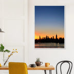 Wooden framed Manhattan skyline sunset poster, majestic travel wall art for home decor, part of Studio Edition collection.