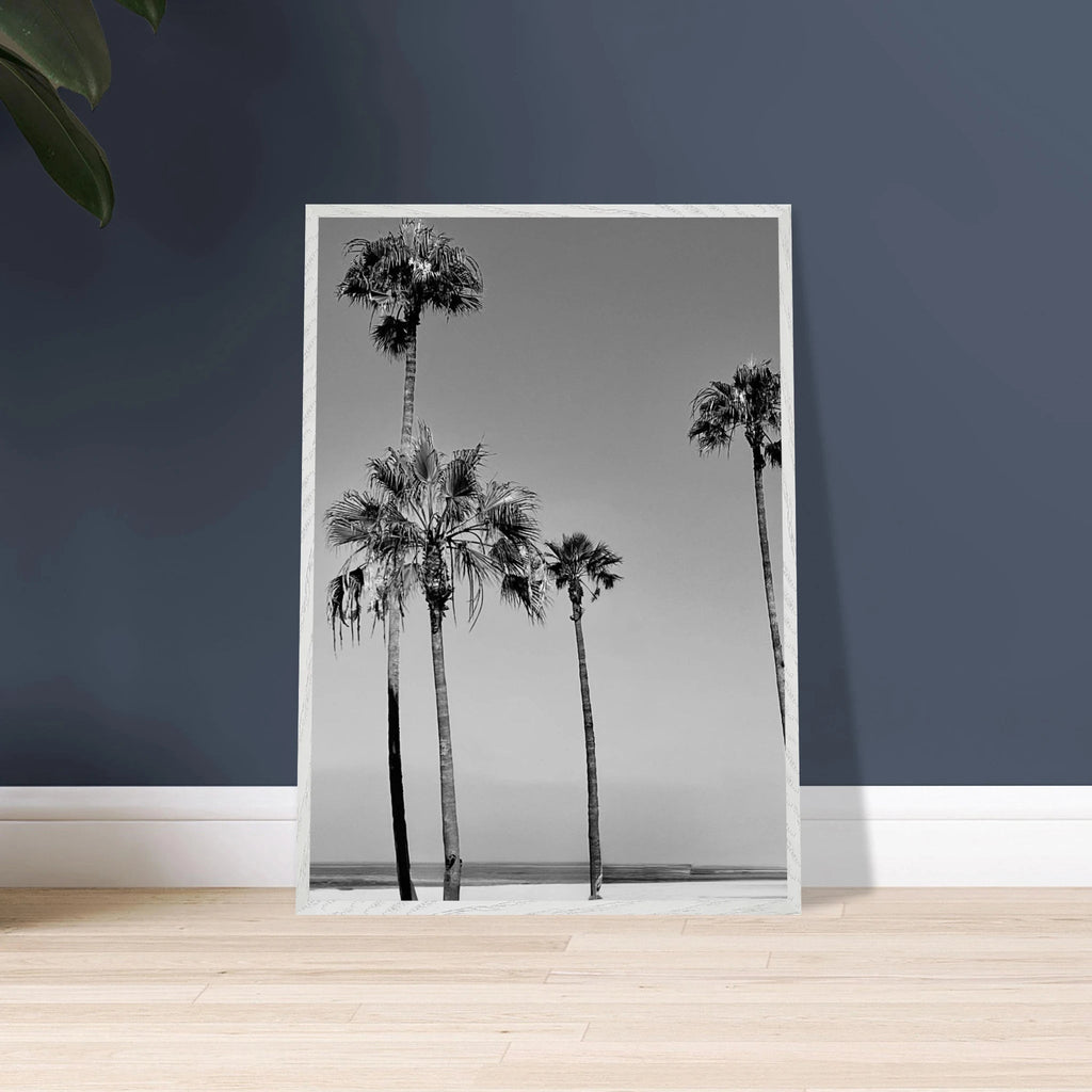 Premium wooden framed poster featuring black and white SoCal beach icons, part of the Holiday 25 studio edition art series.