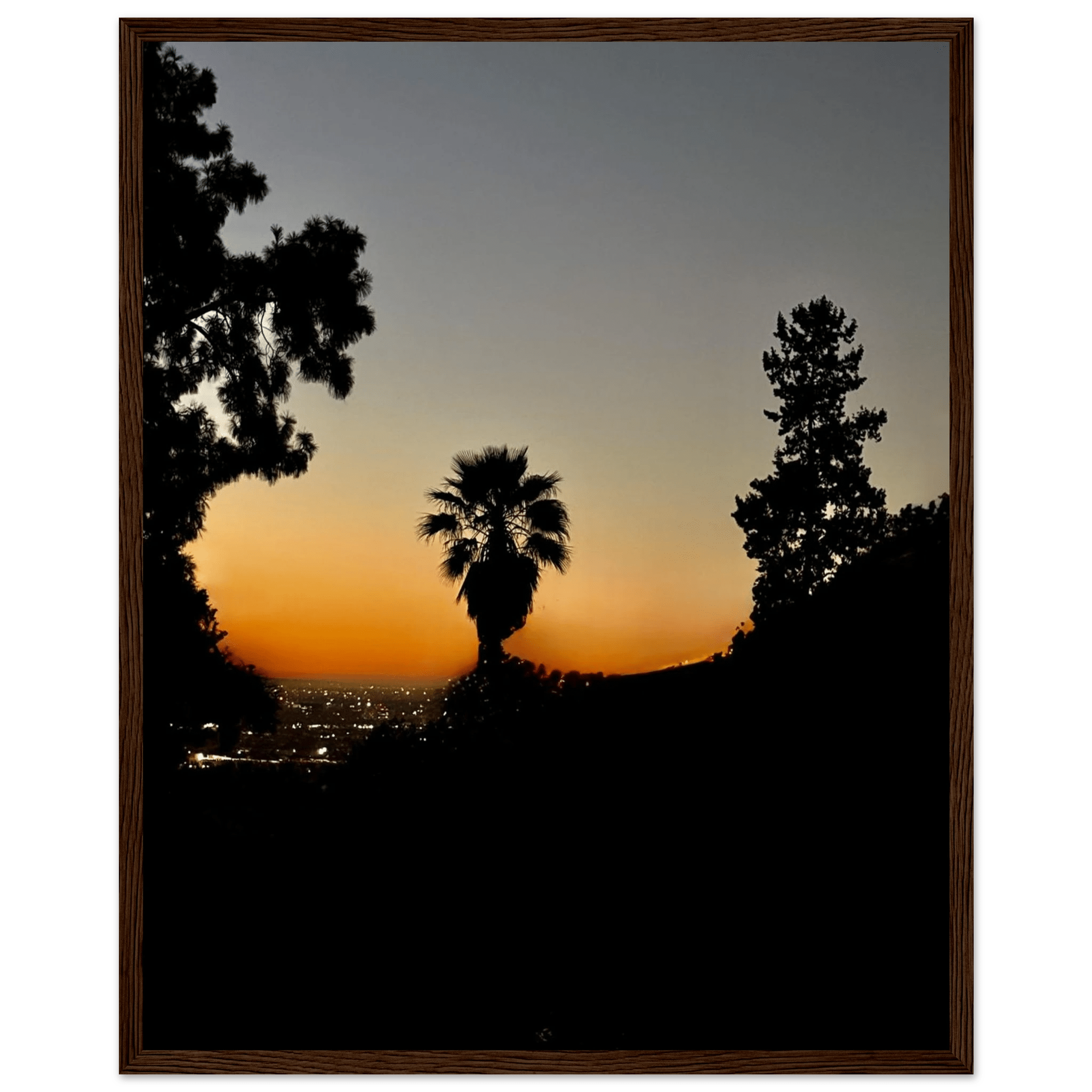 Framed poster of a dramatic winter sunset over Laurel Canyon and Hollywood Hills, featuring California landscape artwork.