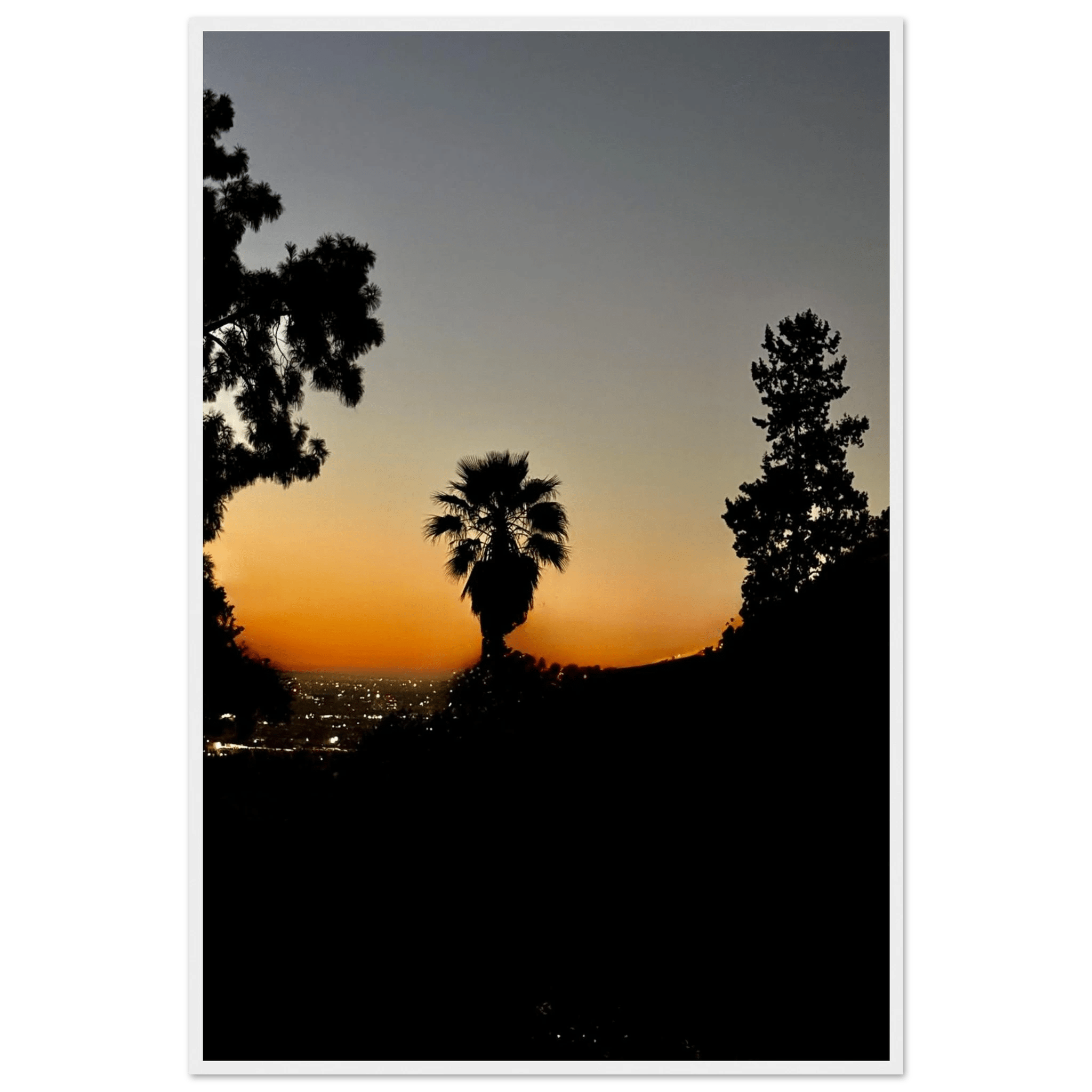 Framed print of a winter sunset over Laurel Canyon and Hollywood Hills, California poster art with white frame, studio edition.