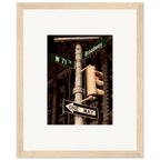 NYC Series framed poster featuring iconic street signs, urban decor print on white frame from the Studio Edition travel collection.