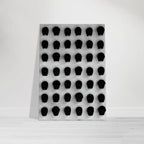 Monochrome skull grid canvas wall art in black and white, minimalist statement photography print, 20x30 cm, Travel Collection Studio Edition.