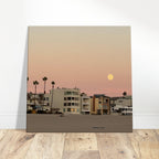 California beach wall art print by Moody SoCal Beach, hangs on bedroom wall, featuring vibrant coastal scene on canvas.