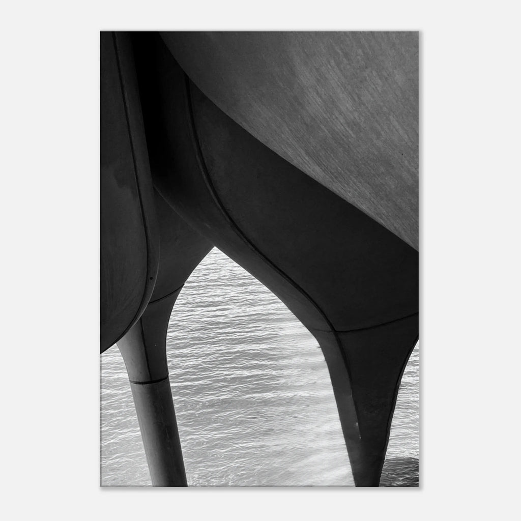 Black and white abstract canvas print of NYC Hudson River pier with high heels in water, part of the Studio Edition Travel Collection.