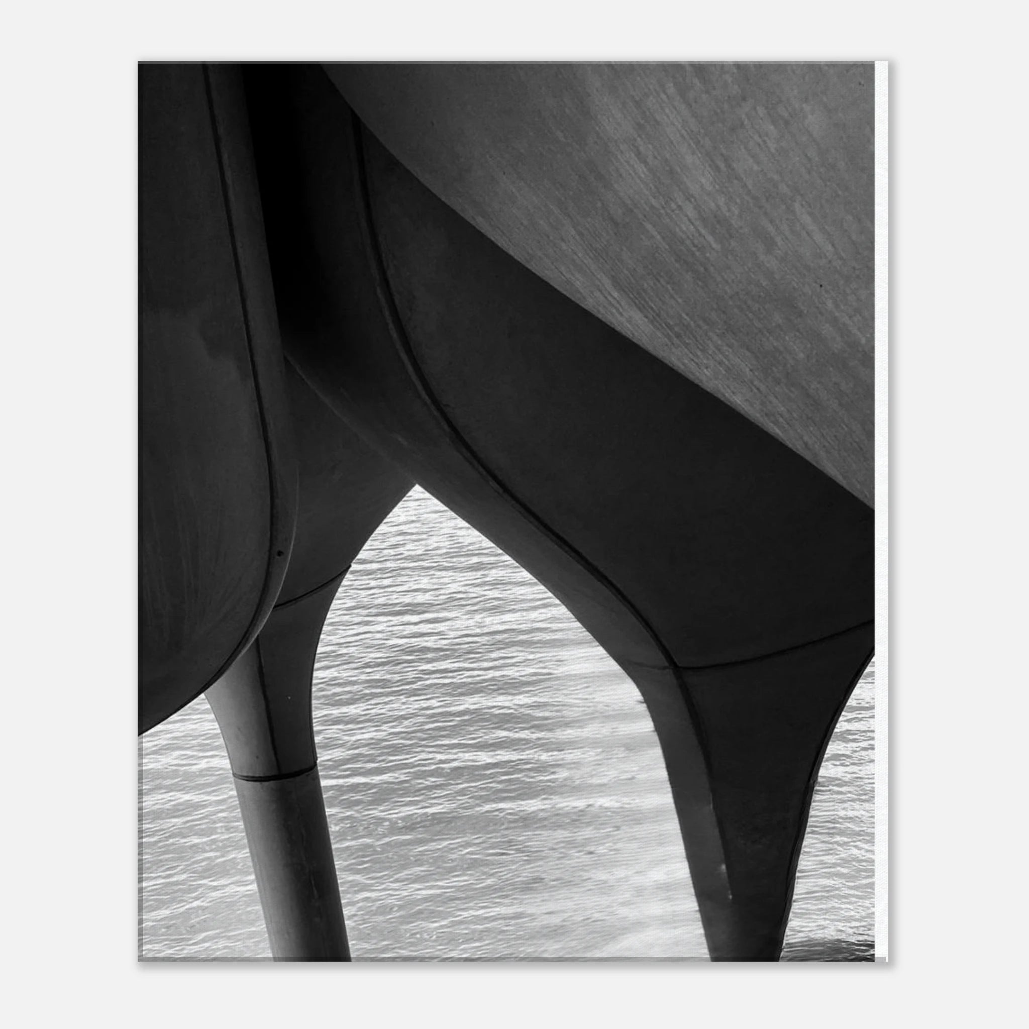 Abstract black and white canvas art print of NYC Hudson River pier with high heels in water, part of the Travel Collection Studio Edition.