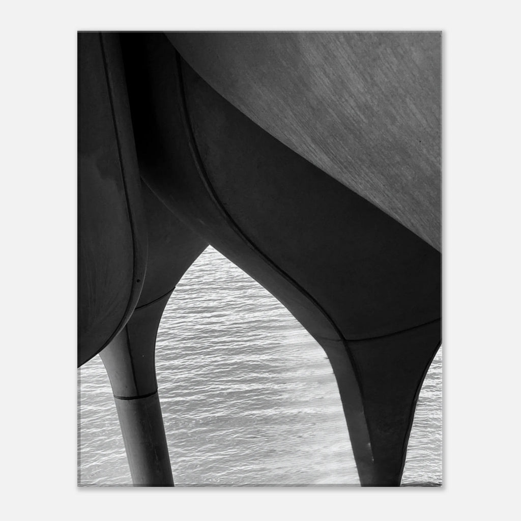 Black and white abstract canvas print of NYC Hudson River Pier with high heels in water, from the Studio Edition Travel Collection.