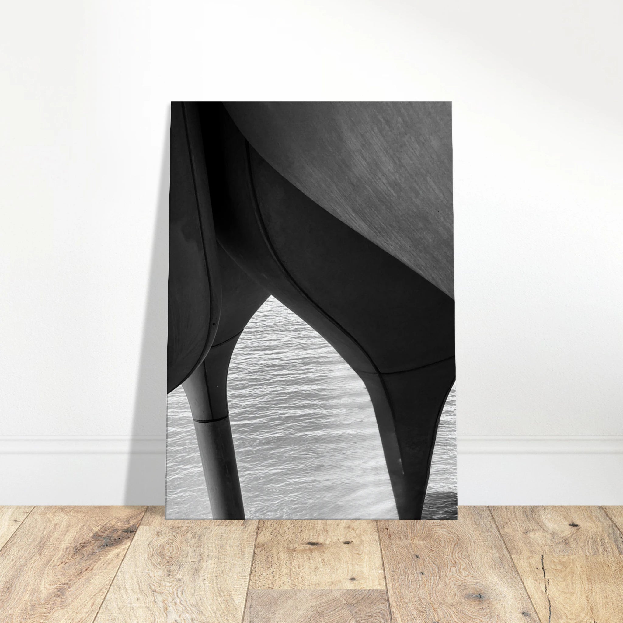 Black and white abstract canvas print of NYC Hudson River pier with high heels in water, part of the Travel Collection Studio Edition.