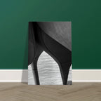 Black and white abstract canvas art print of NYC Hudson River pier with high heels in water, part of the Studio Edition travel collection.