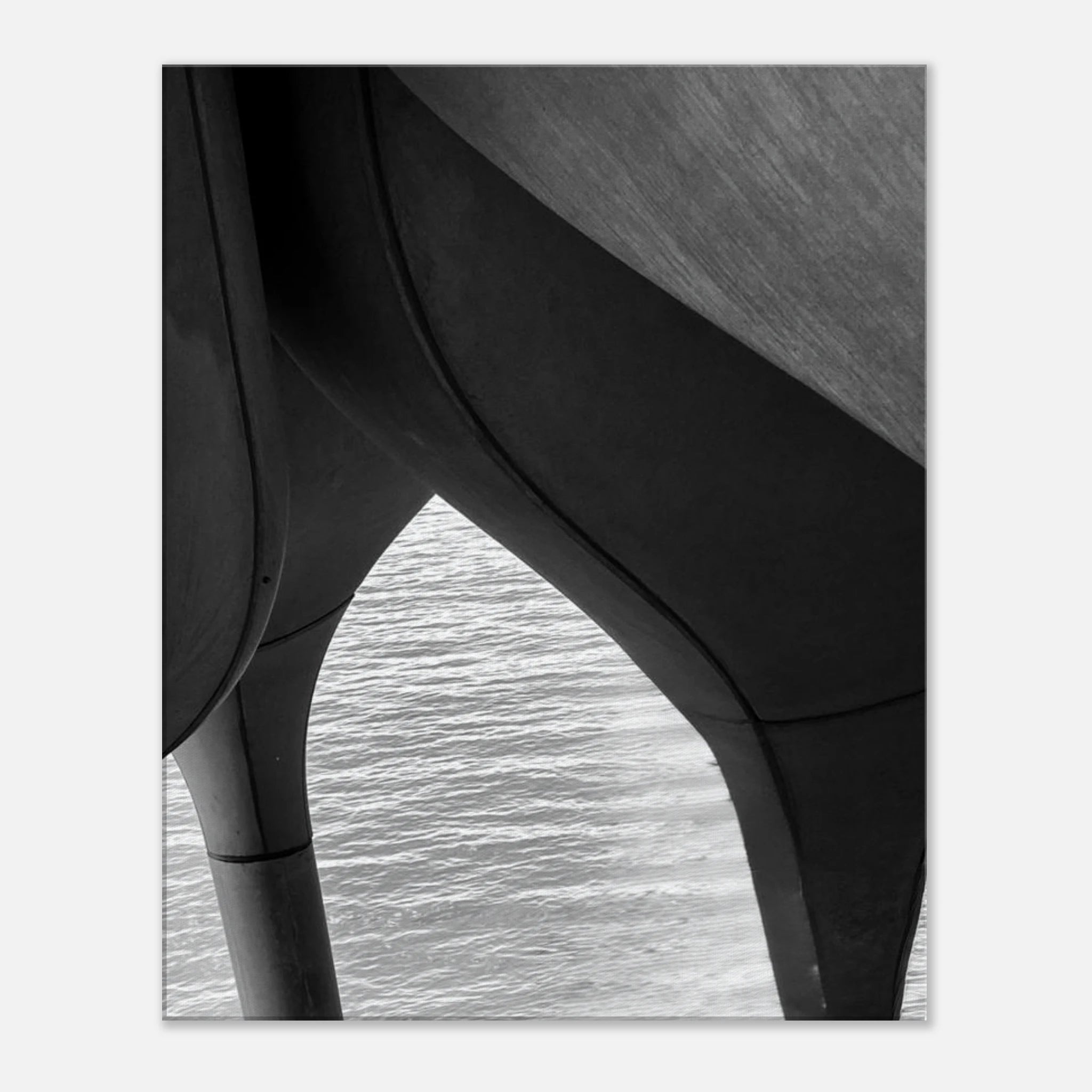 Black and white abstract canvas print of NYC Hudson River pier with high heels in water, part of the Travel Collection studio edition.
