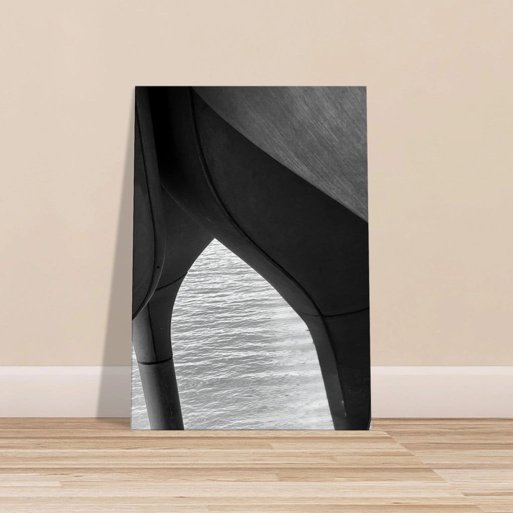 Abstract black and white canvas print of NYC Hudson River Pier with high heels in water, part of the Studio Edition travel collection.