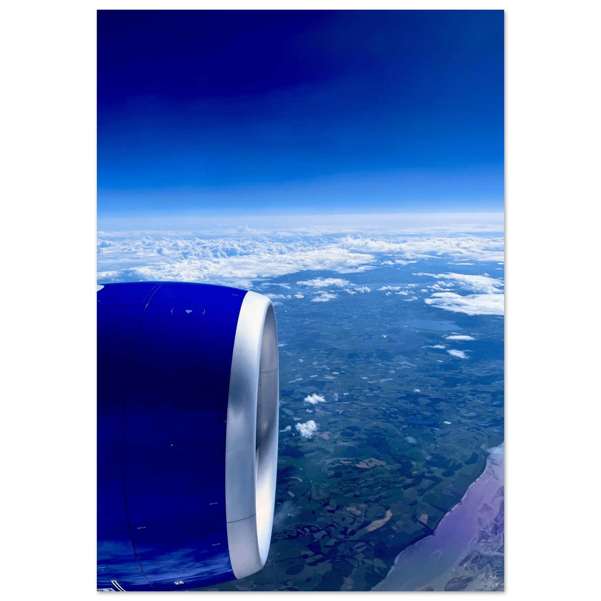 Aluminum print of an airplane turbine with a cross-Atlantic view, part of the travel collection artwork by My Store.