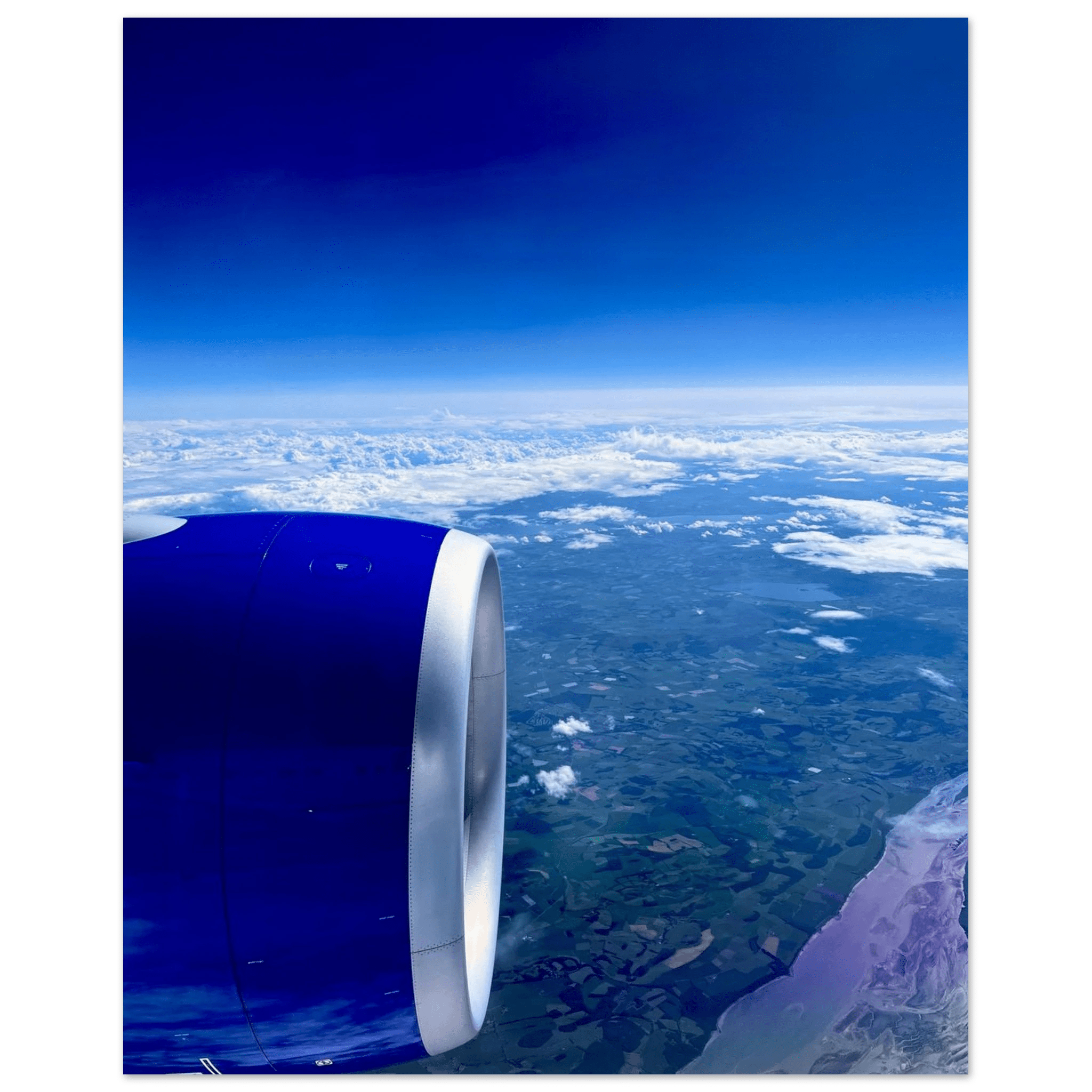 Aluminum print of an airplane turbine with a cross-Atlantic view, part of the travel collection, studio edition artwork.