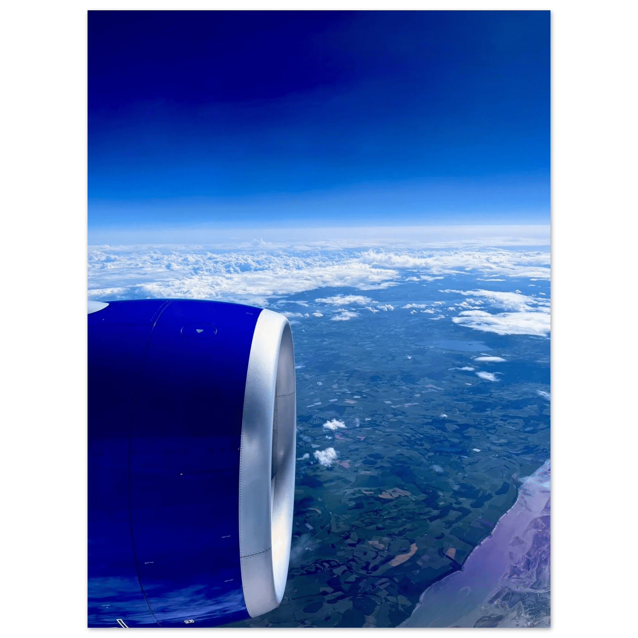 Aluminum print of a cross-Atlantic airplane turbine view artwork, perfect for travel-themed decor.