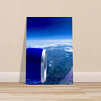 Aluminum print of an airplane turbine with a cross-Atlantic view, part of the travel collection studio edition.