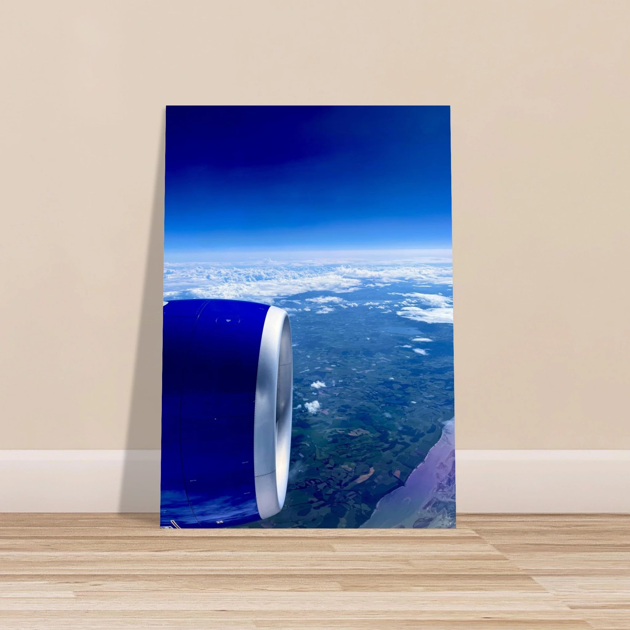 Aluminum print of an airplane turbine with a cross-Atlantic view, part of the travel collection studio edition.