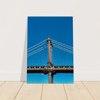 Sunny Winter Day canvas print of Manhattan Bridge in NYC, featuring vibrant winter scenery and urban skyline artwork.