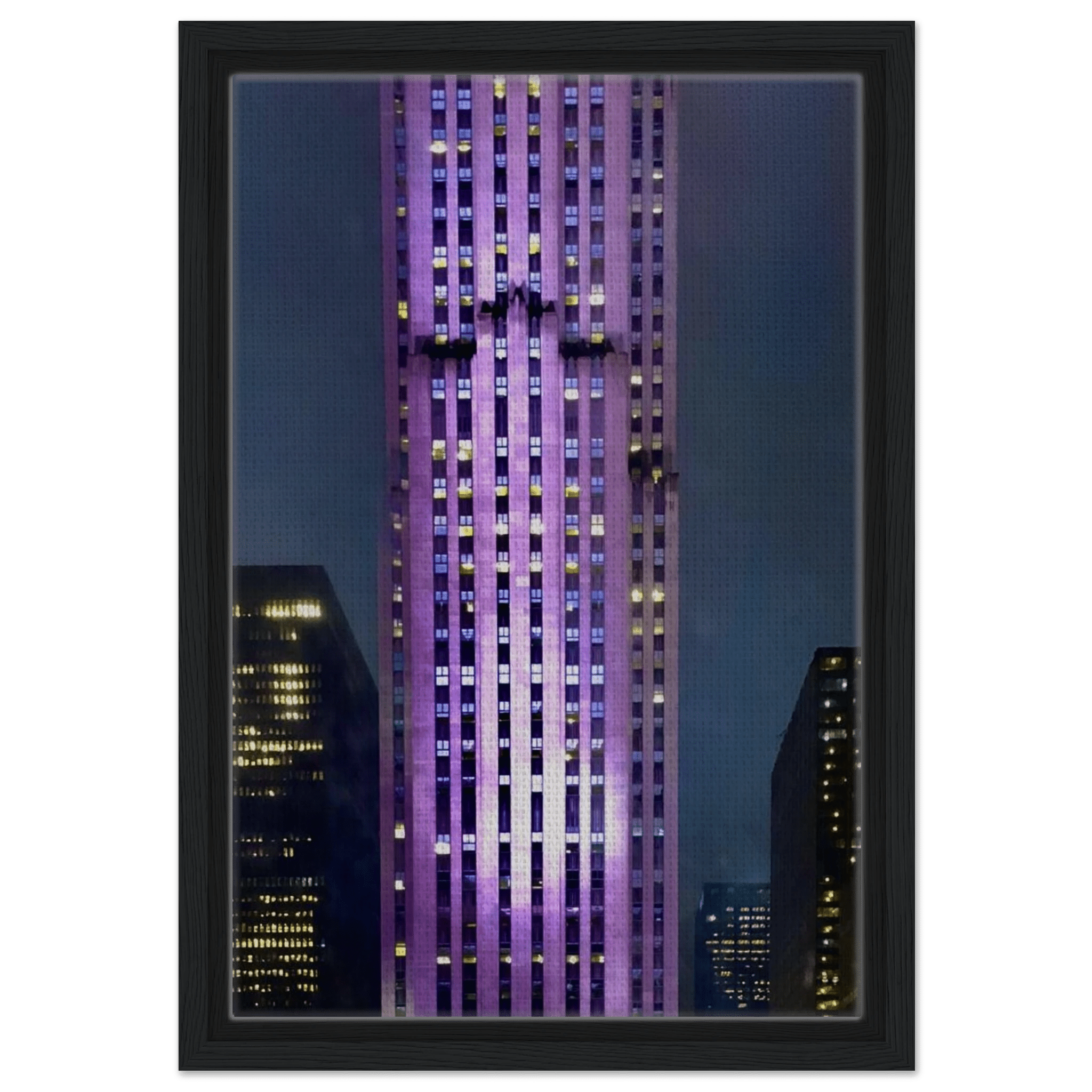 Framed canvas print of NYC holiday skyline in purple hues from the Travel Collection, Studio Edition, showcasing iconic city buildings.