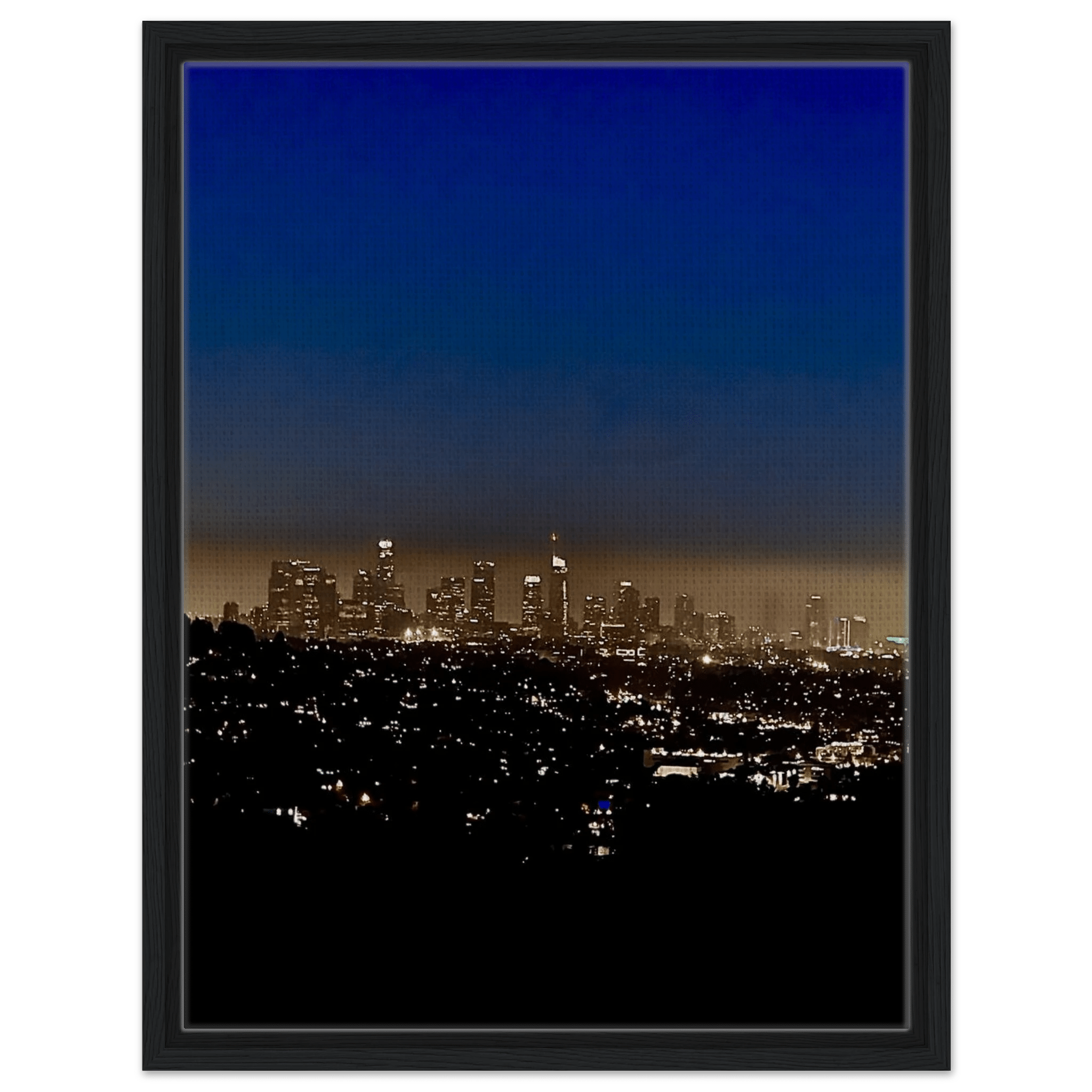 Premium wooden framed canvas print of Los Angeles downtown night glow, elegant wall art featuring California cityscape.