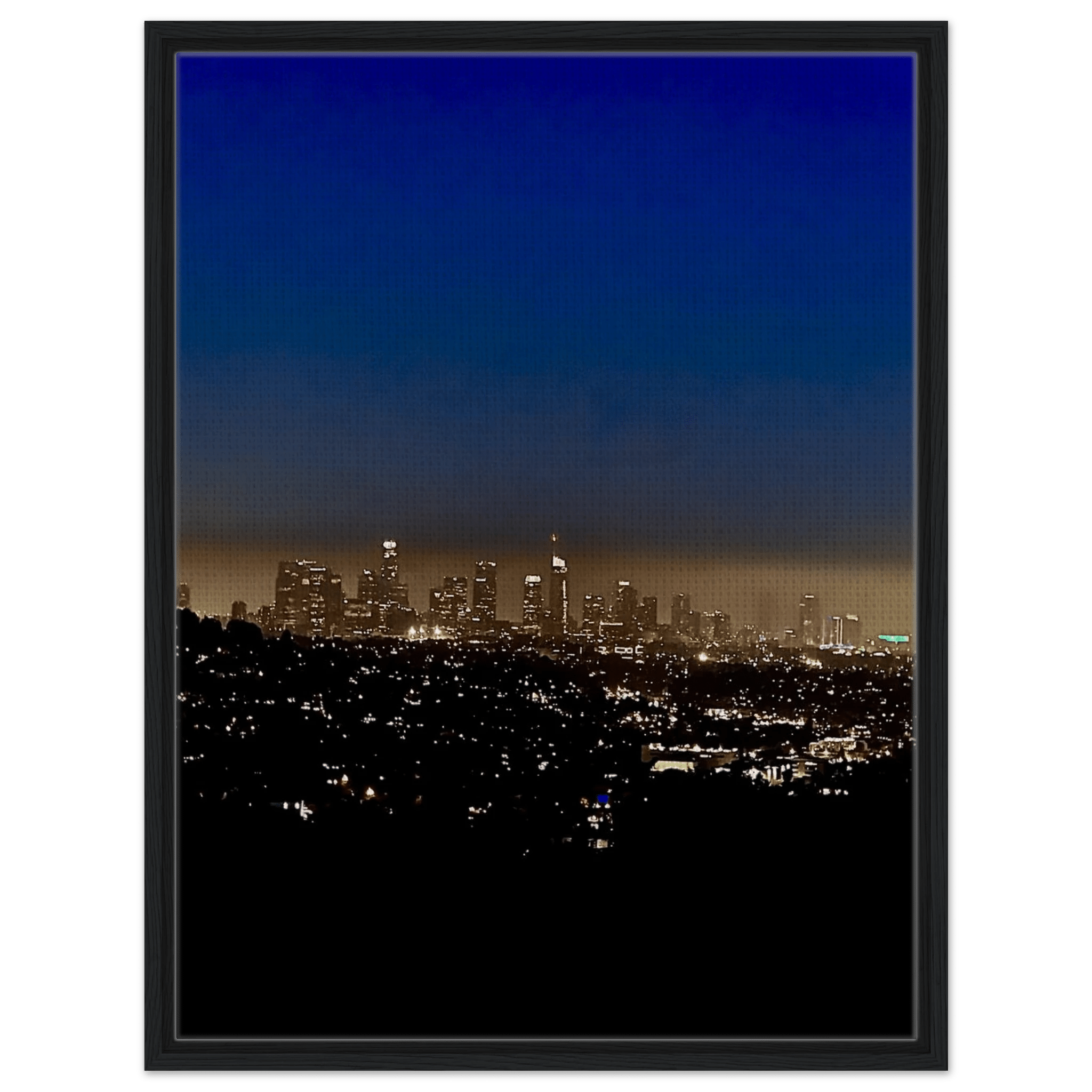 Premium wooden framed canvas print of Los Angeles Downtown Nightglow, elegant home wall art showcasing California skyline at night.