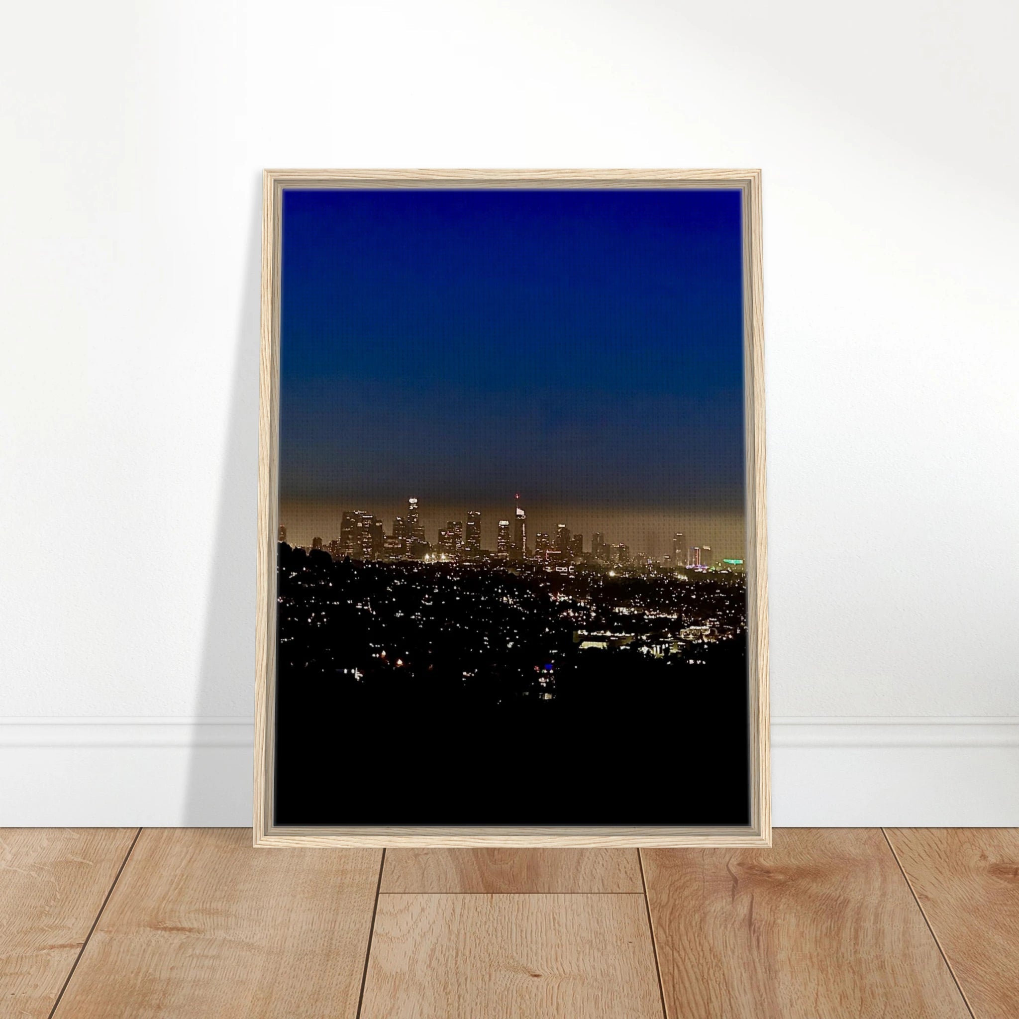 Premium wooden framed canvas print of Los Angeles Downtown Nightglow, elegant home wall art, 20x30 cm studio edition.
